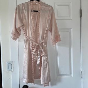 Blush, mid length, silky robe.
